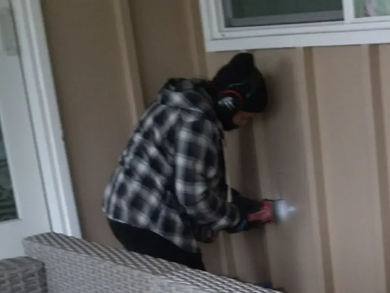 Professional electrician installing an exterior outlet in Oroville